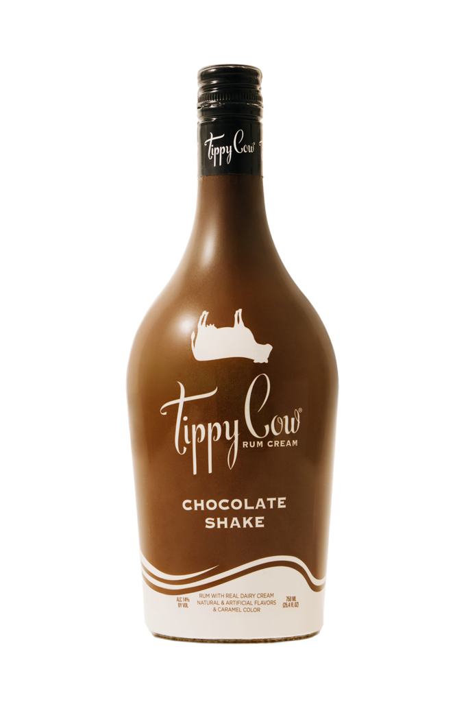 A brown bottle of Tippy Cow Chocolate Shake Rum Cream with a white cow silhouette logo.